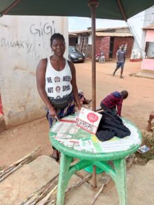 A beneficiary at her business
